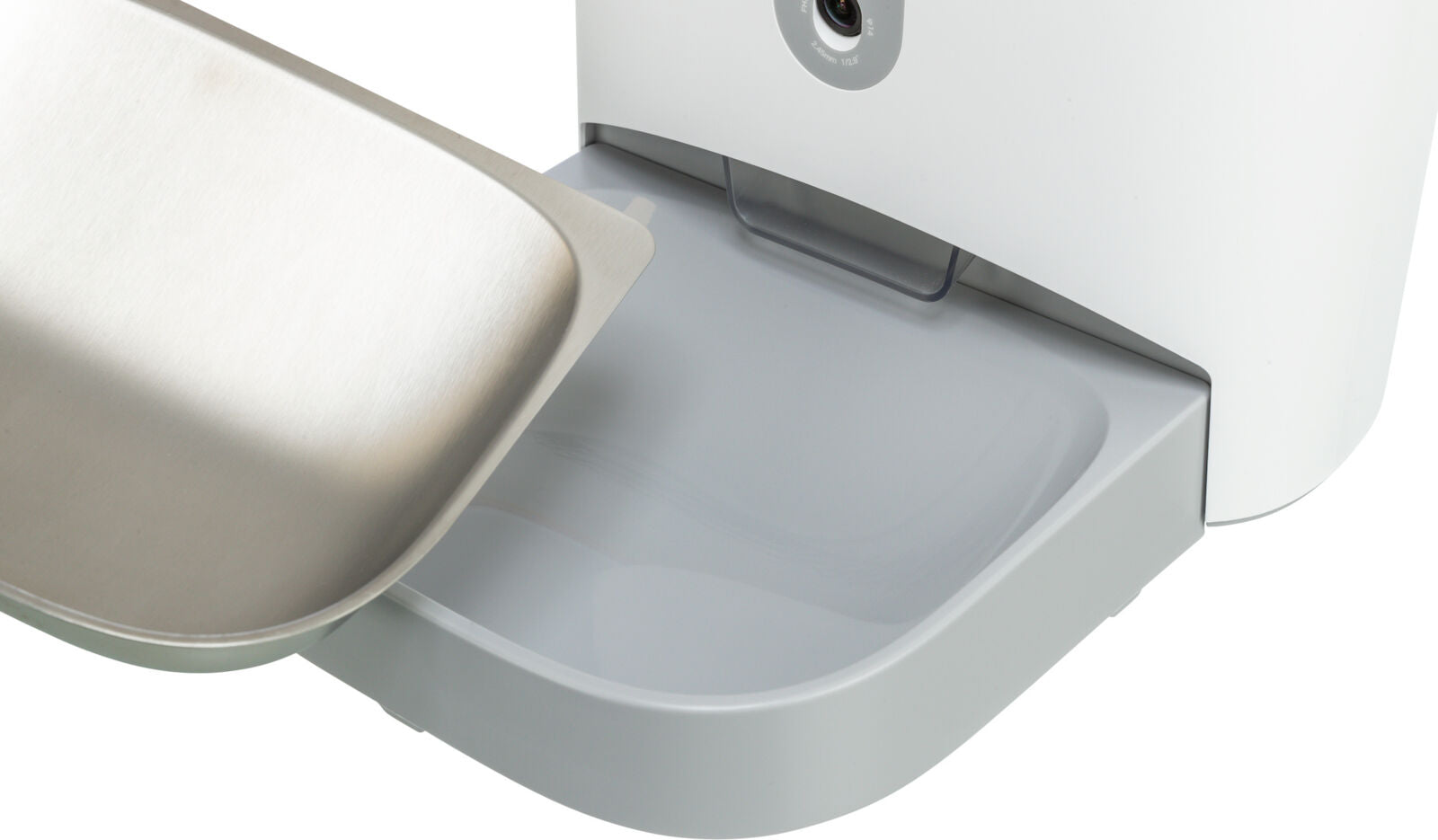 Ein geöffneter, weißer und silberner Behälter mit einem herausziehbaren Fach und einem Metalldeckel.