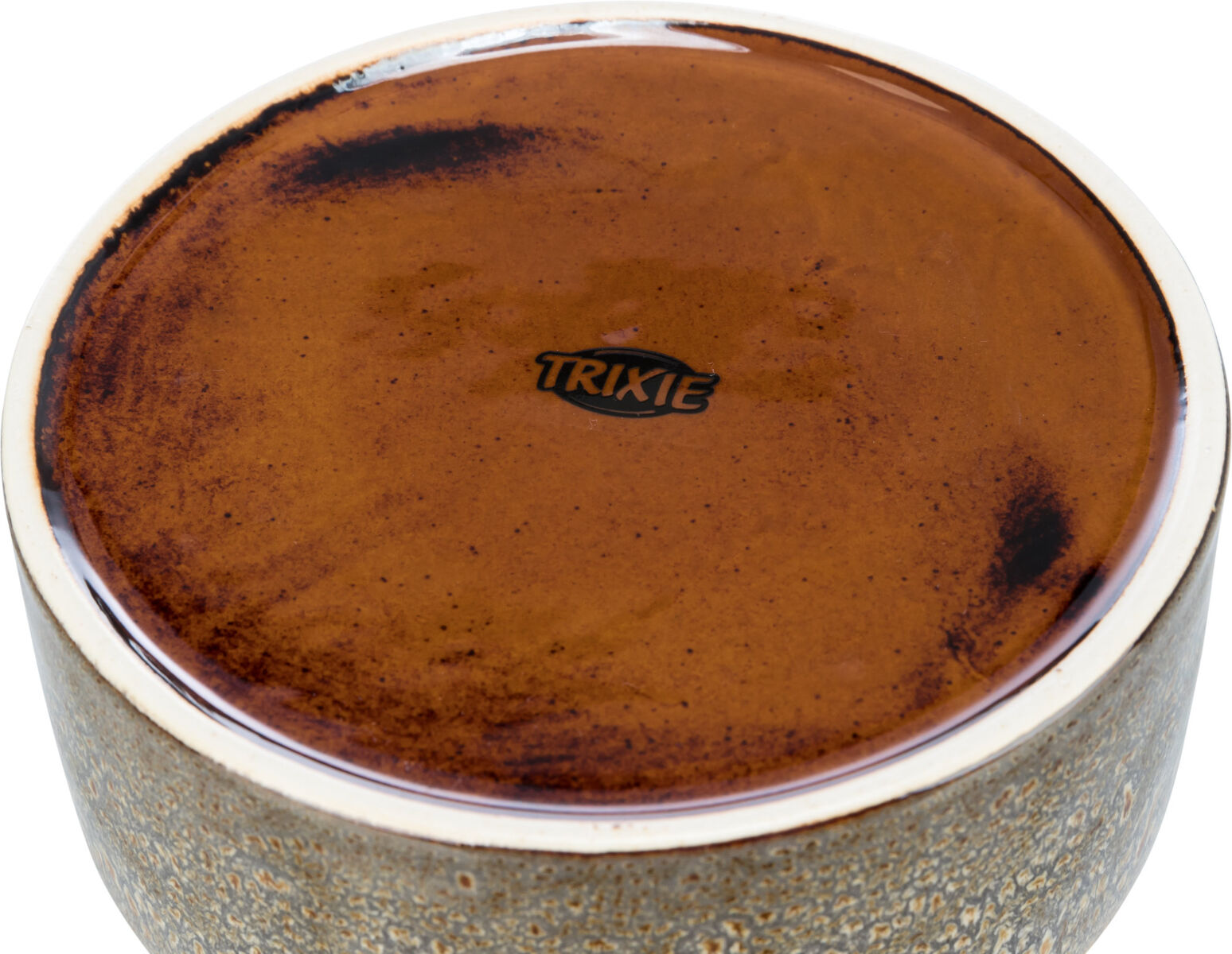 Braune Keramikschale mit glänzender Oberfläche, schwarze Flecken und mittelbrauner "TRIXIE"-Schriftzug.