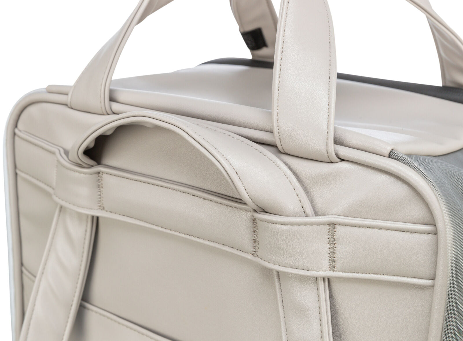 Beige Tragetasche mit strukturiertem Textildetail an der Seite, robusten Nähten und zwei Griffen an der Oberseite.