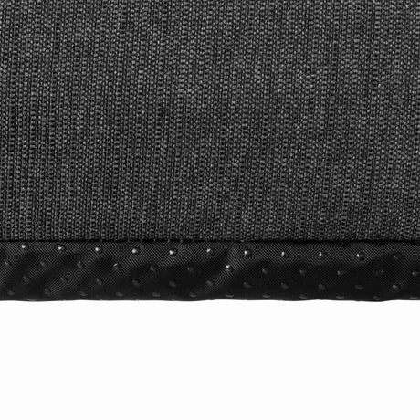 Grauer, strukturiert gewebter Stoff mit schwarzem Rand, der kleine Punkte hat.