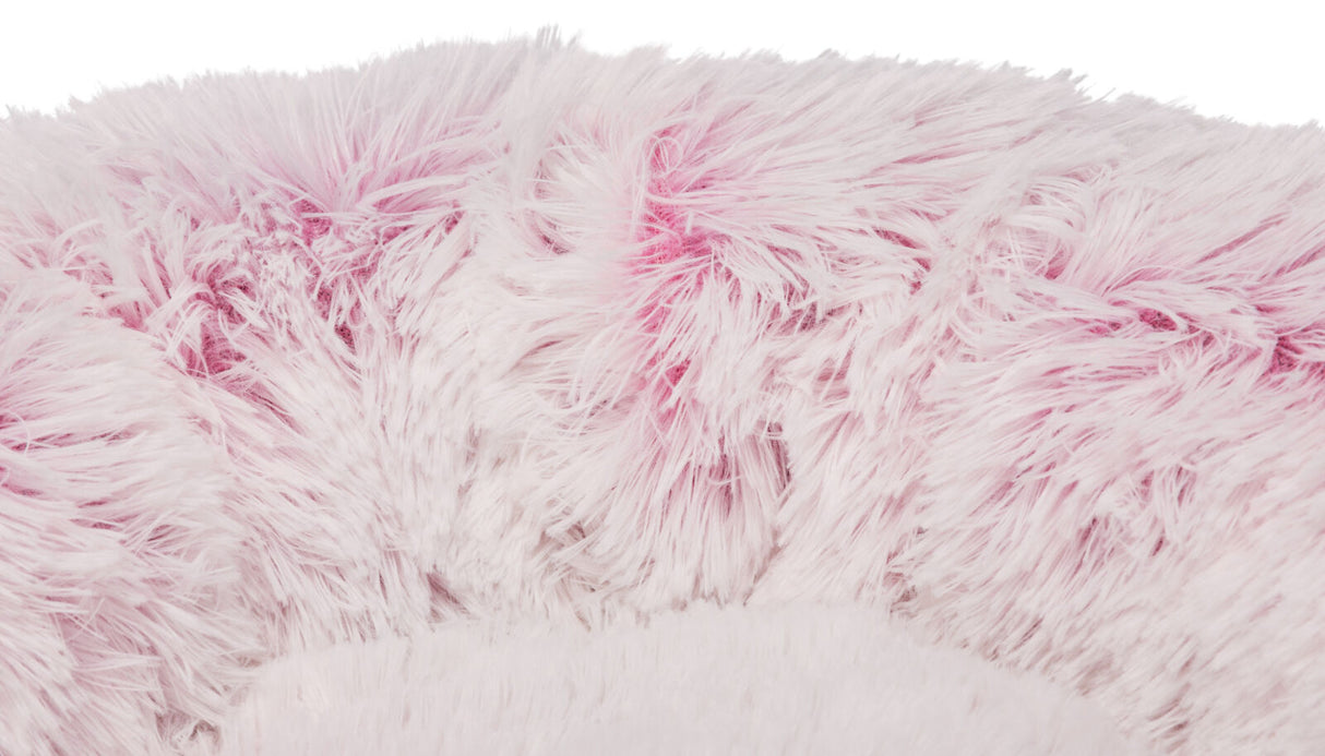 Weiches, flauschiges Textilmaterial in Rosa und Weiß.