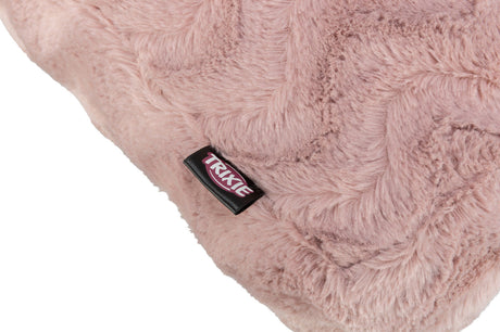 Rosa, flauschiges Material mit einem Etikett mit der Aufschrift "Trixie".
