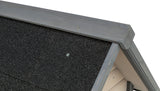 Schwarzes, grobkörniges Dachmaterial mit grau gestrichenem Holzrahmen, Detailaufnahme einer Konstruktionsektion.