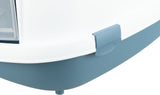 Ausschnitt einer Katzentoilette mit abgerundeter blauer Basis und weißem Deckel mit transparentem Element.