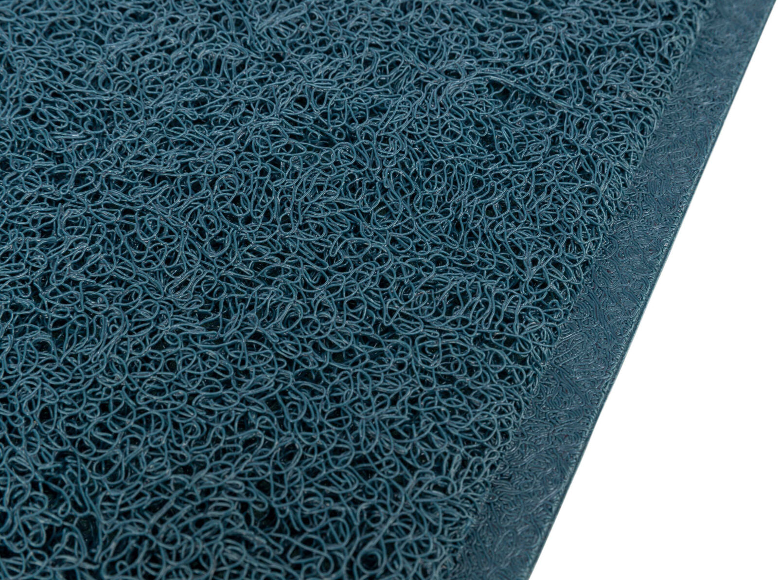 Matte mit texturierter, verschlungener Oberfläche in dunkelblauer Farbe, Nahaufnahme der Struktur.