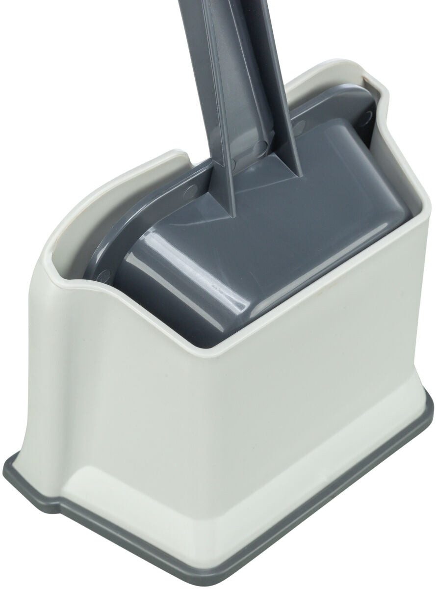 Weiße Bürstenhalterung mit grauem Einsatz und Griff, minimalistisch und funktional gestaltet.