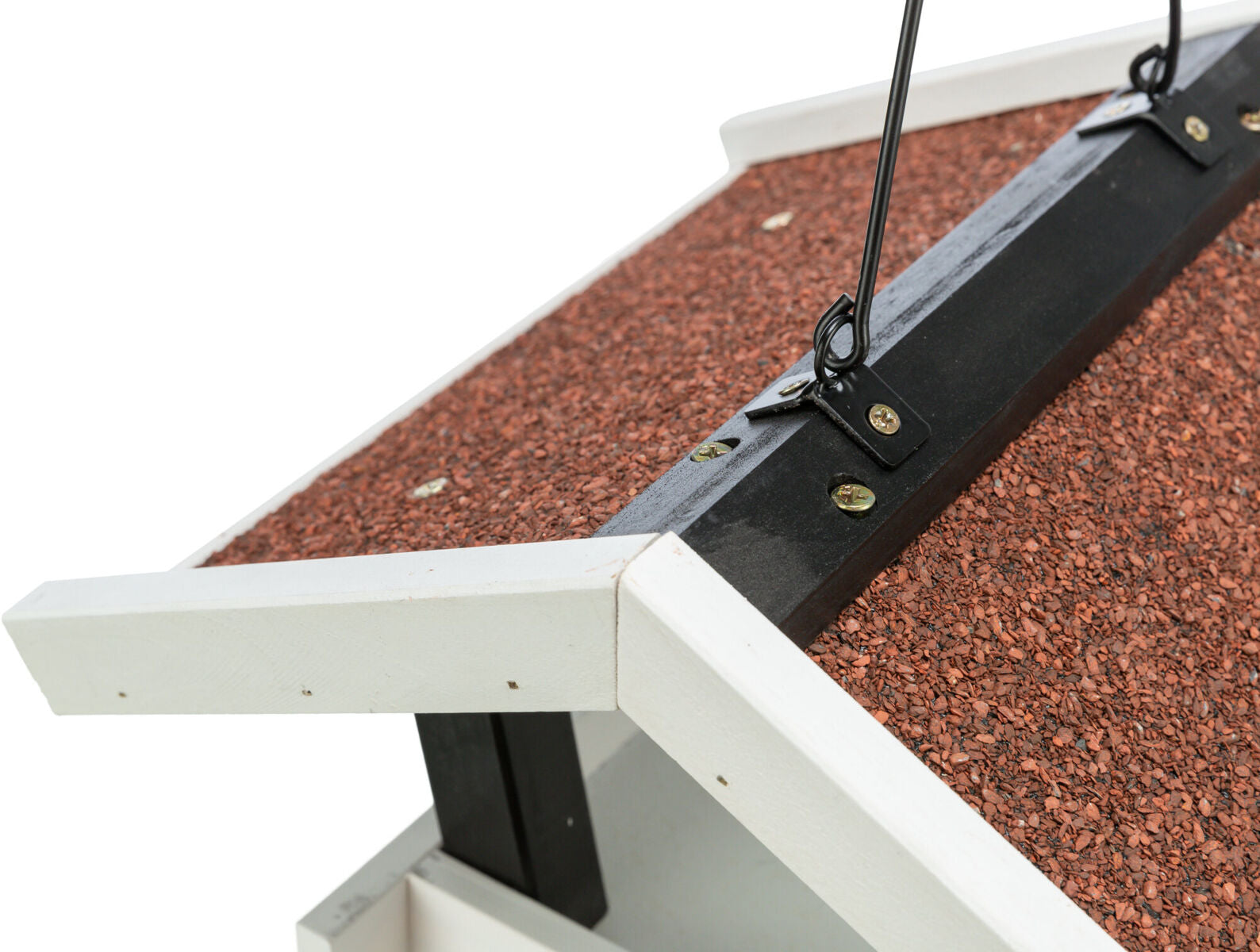 Dachansicht eines weißen Vogelhäuschens mit schwarzer Halterung und brauner Dachbedeckung aus grobem Material.