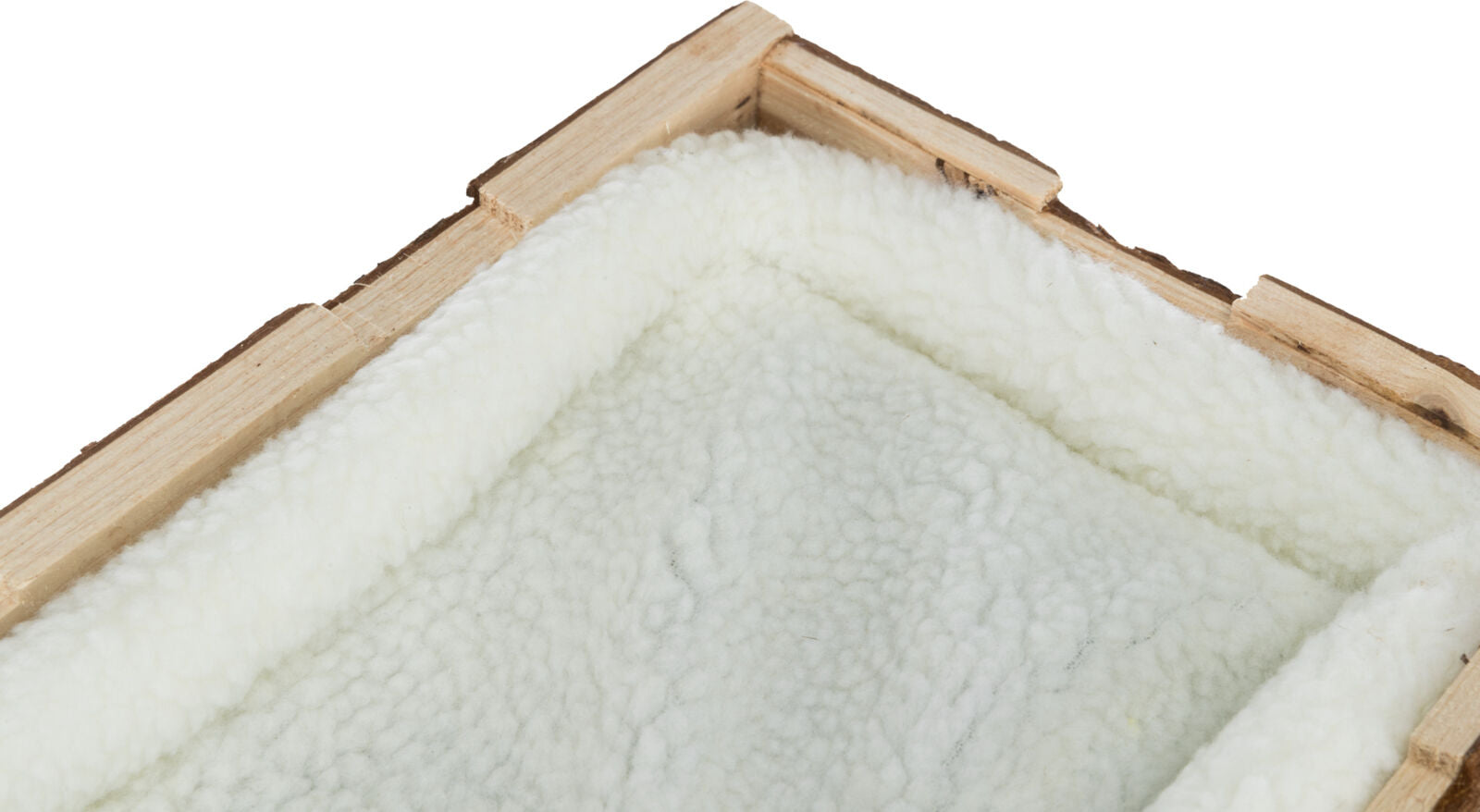 Ecke einer Holzstruktur mit einer weißen, flauschigen Innenpolsterung.