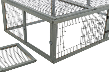 Rechteckiges Gittergehege aus grau lackiertem Holz mit Metallgitter und abnehmbarer Oberseite.