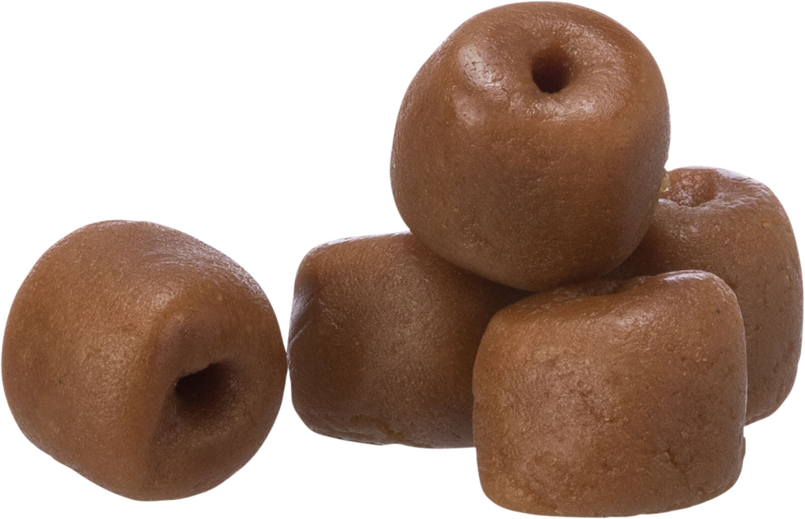 Braune, zylindrische Objekte mit kleinen Löchern in der Mitte, in einem Stapel angeordnet.