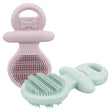 Zwei silikonartige, pastellfarbene Bürsten mit Griffen, rosa und mintgrün, jeweils mit Knochenmotiv.
