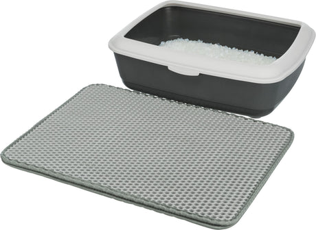 Offene Katzentoilette aus schwarzem Kunststoff mit weißem Rand, davor eine graue strukturierte Matte.